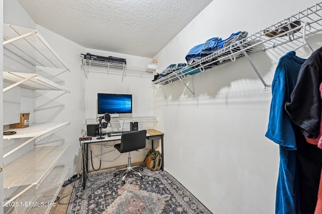 office area featuring a textured ceiling