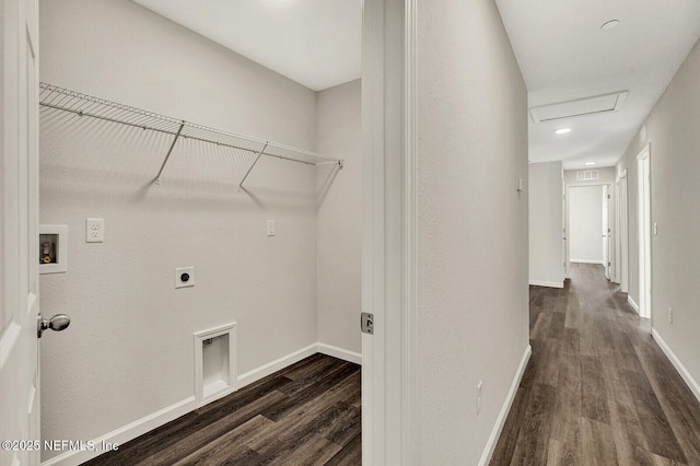 clothes washing area featuring electric dryer hookup, washer hookup, and dark hardwood / wood-style floors