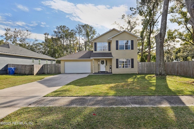 view of front property featuring a front yard and a garage