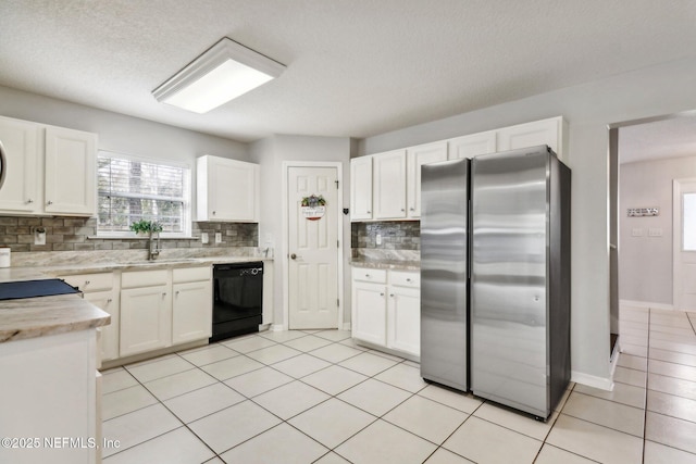 kitchen featuring backsplash, white cabinets, a textured ceiling, dishwasher, and stainless steel refrigerator