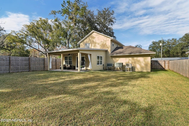 rear view of property with a patio, central AC unit, ceiling fan, and a lawn