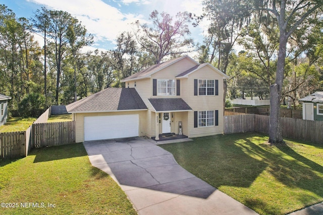 front of property featuring a front yard and a garage