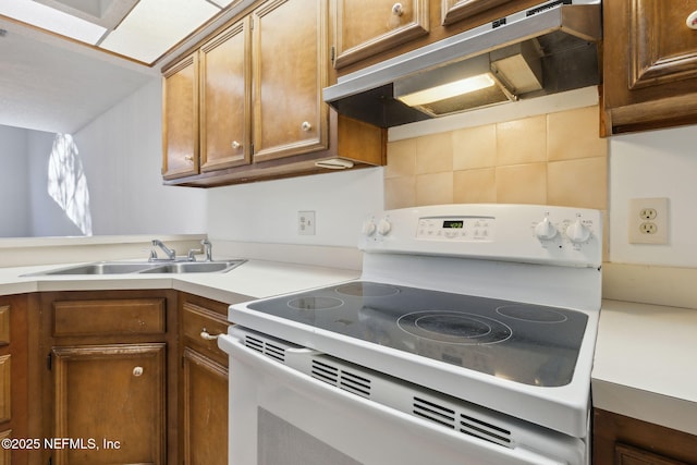 kitchen with sink and electric stove