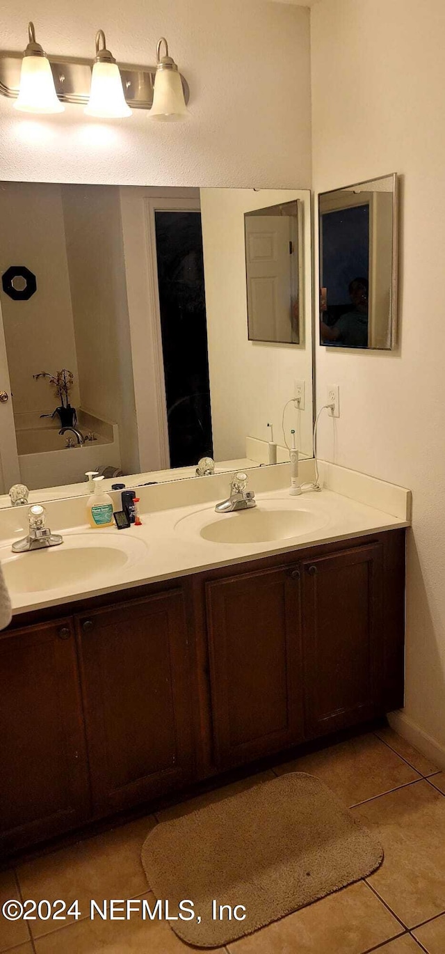 bathroom featuring vanity and tile patterned floors