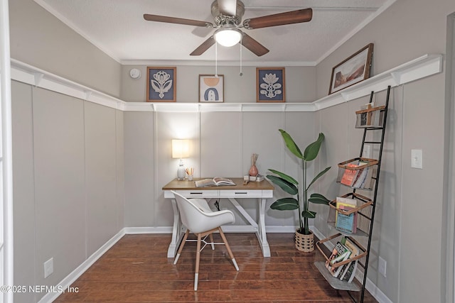 home office featuring ceiling fan, dark hardwood / wood-style flooring, and crown molding