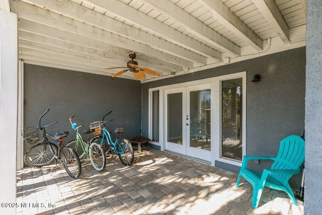 view of patio with ceiling fan and french doors