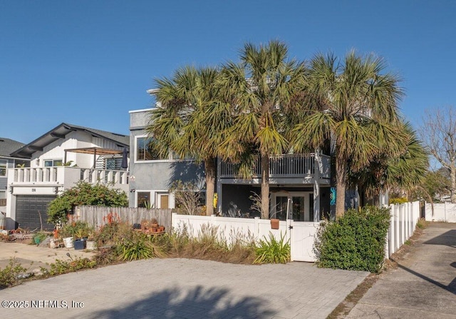 view of front of home with a balcony