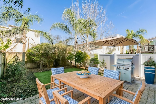 view of patio / terrace featuring a grill