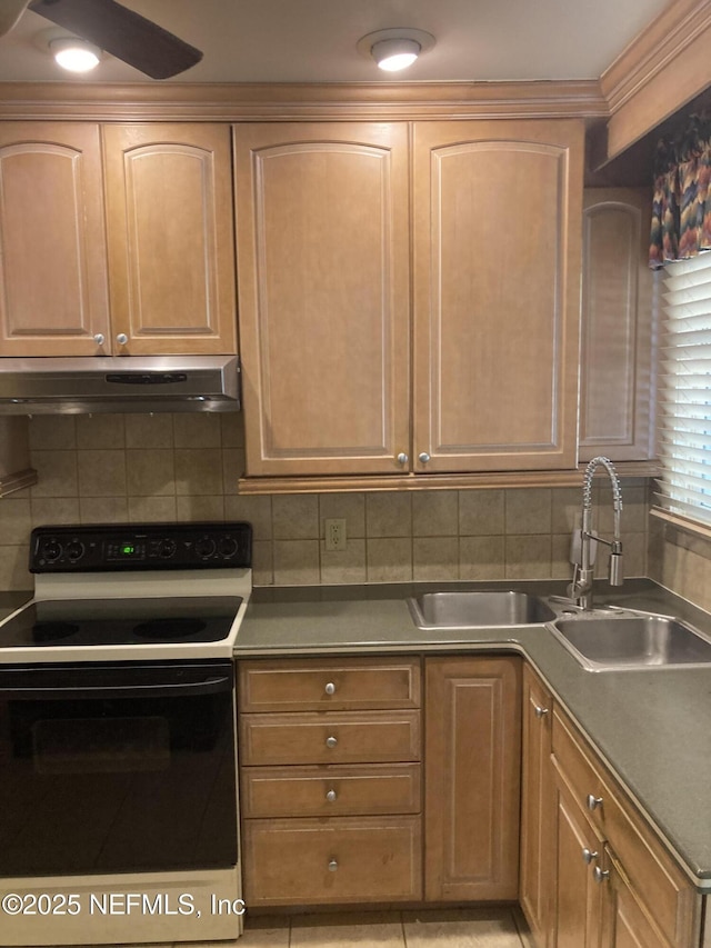 kitchen with electric stove, sink, decorative backsplash, light tile patterned floors, and ornamental molding