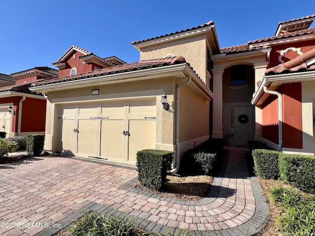 view of property exterior with a garage