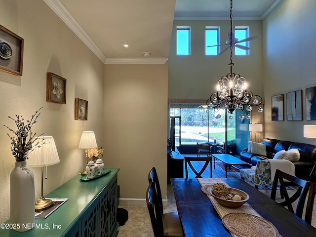 carpeted dining area with a high ceiling, crown molding, a wealth of natural light, and an inviting chandelier