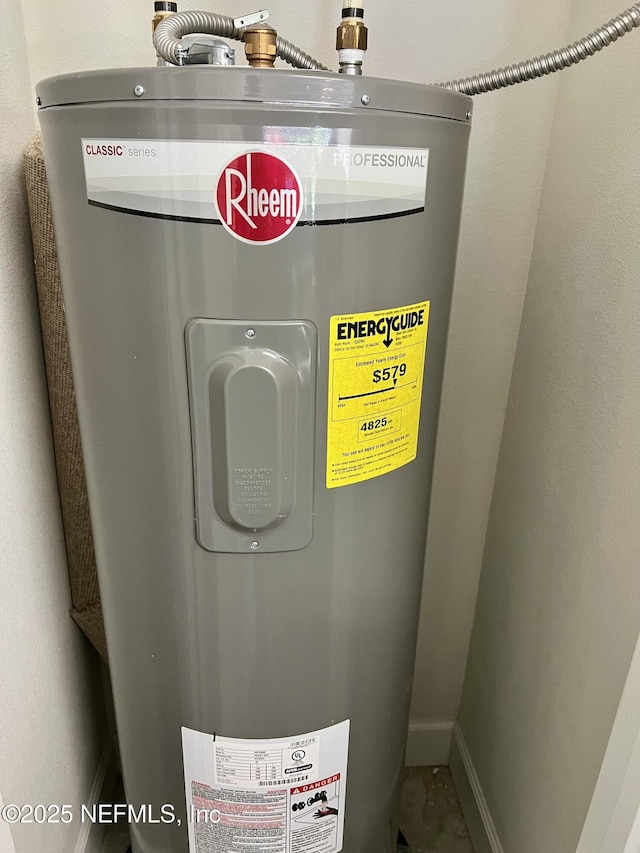 utility room featuring electric water heater