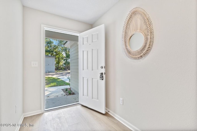 foyer featuring light hardwood / wood-style floors