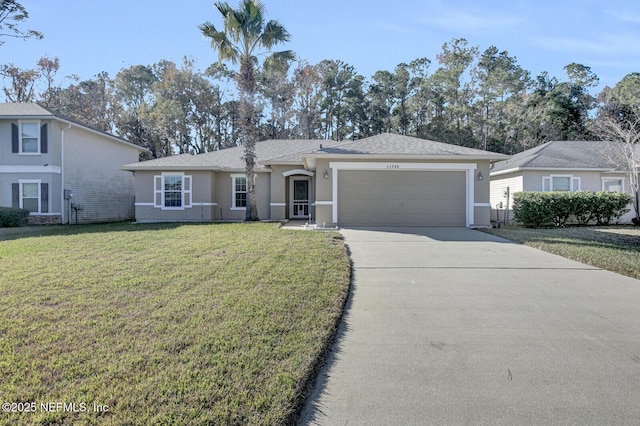 ranch-style home featuring a garage and a front lawn