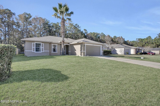 ranch-style home with a garage and a front yard