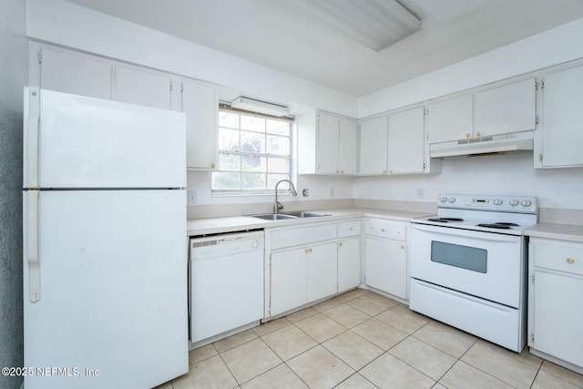 kitchen featuring white cabinetry, sink, light tile patterned floors, and white appliances