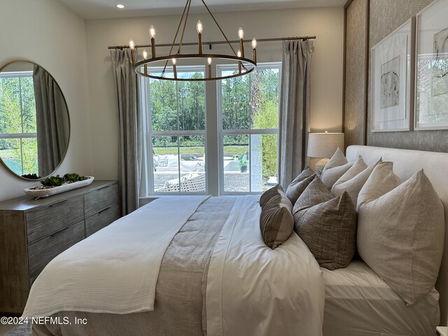 86 Delwood Way Unit 269, Saint Augustine, FL 32092 - bedroom featuring a notable chandelier