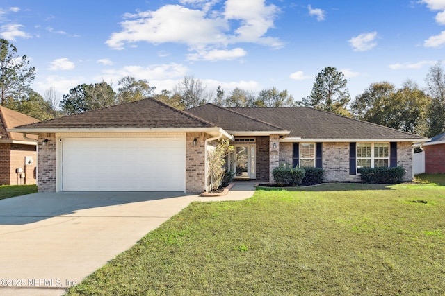 ranch-style home featuring a front yard and a garage