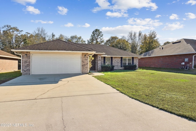 ranch-style house featuring a front yard and a garage