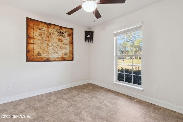 spare room featuring ceiling fan