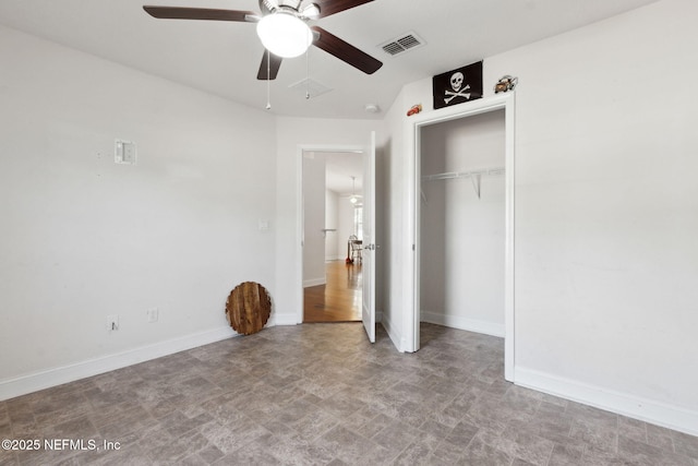 unfurnished bedroom with a closet and ceiling fan