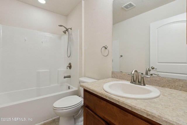 full bathroom featuring shower / washtub combination, vanity, and toilet