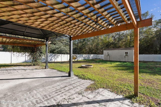 exterior space featuring a yard and an outdoor fire pit