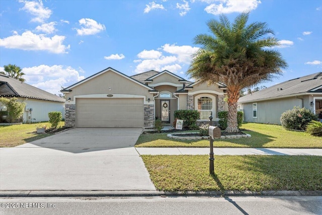 view of front of home featuring a garage and a front lawn