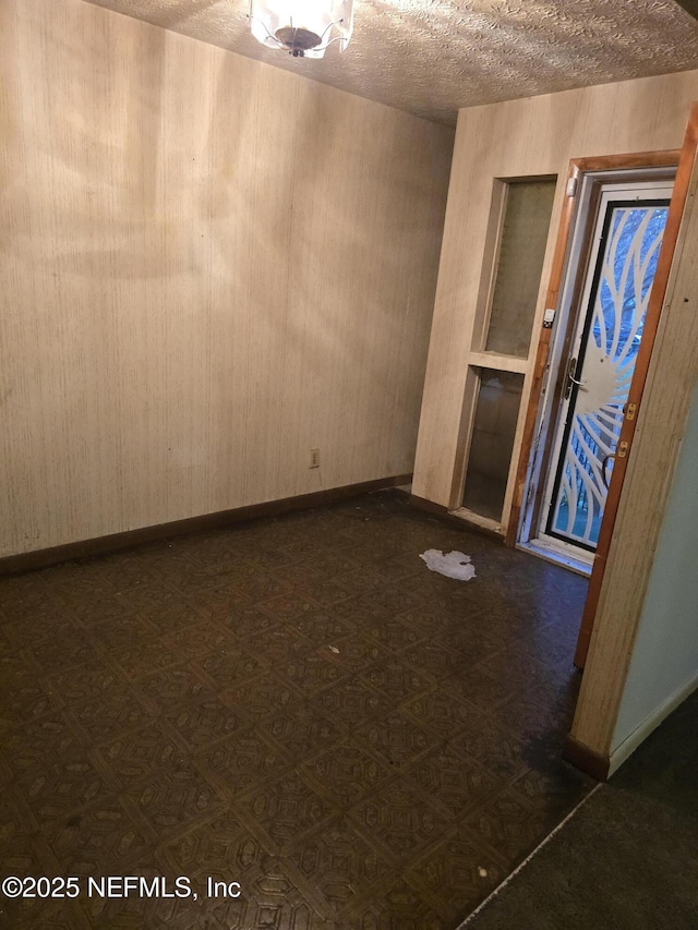 entrance foyer featuring a textured ceiling