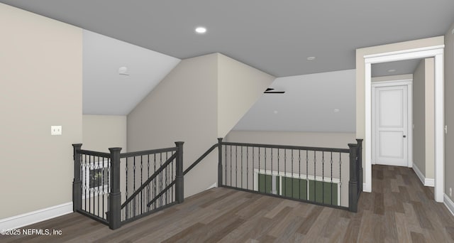 additional living space featuring dark hardwood / wood-style flooring and lofted ceiling