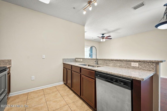 kitchen with sink, a textured ceiling, ceiling fan, kitchen peninsula, and stainless steel dishwasher