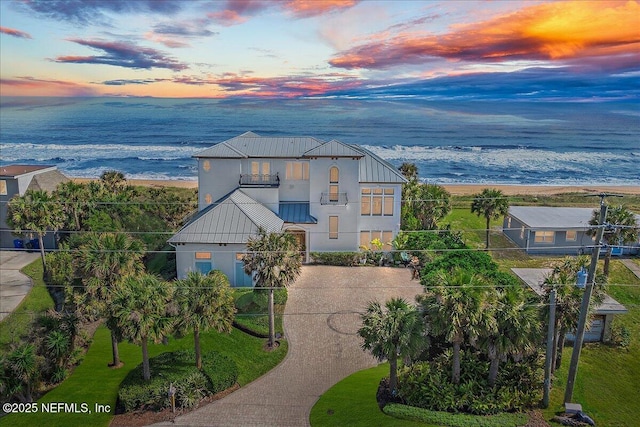 view of front of house featuring a water view