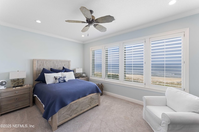 bedroom with ceiling fan, light colored carpet, and ornamental molding