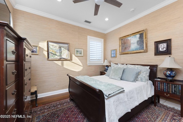 bedroom with dark wood-type flooring, ceiling fan, and ornamental molding