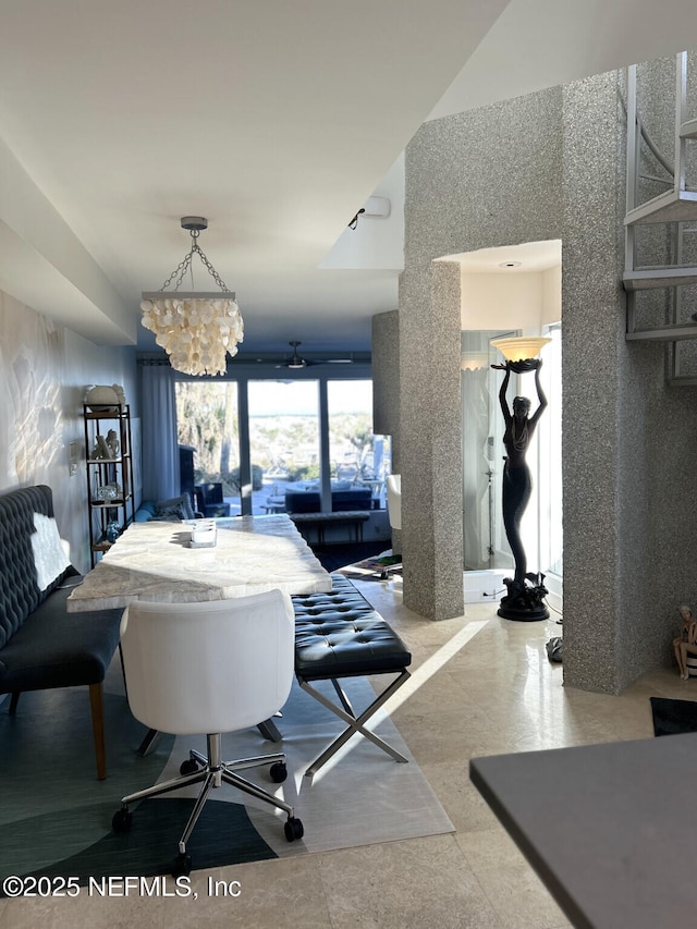 dining room featuring a chandelier