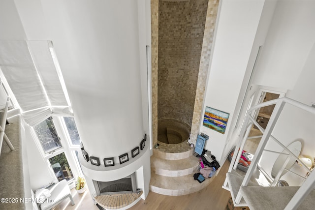 interior space with hardwood / wood-style floors and water heater