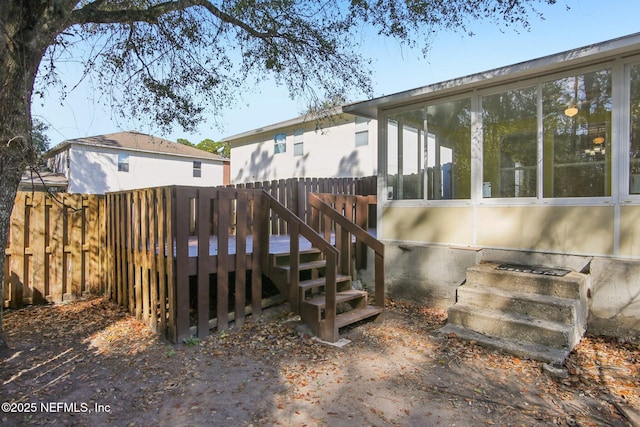 rear view of house with a deck