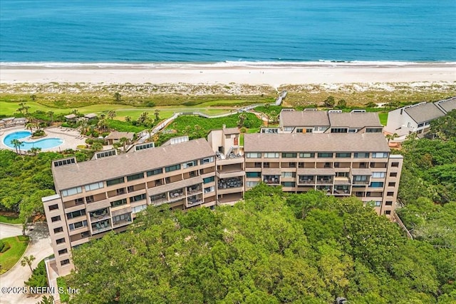 bird's eye view featuring a beach view and a water view