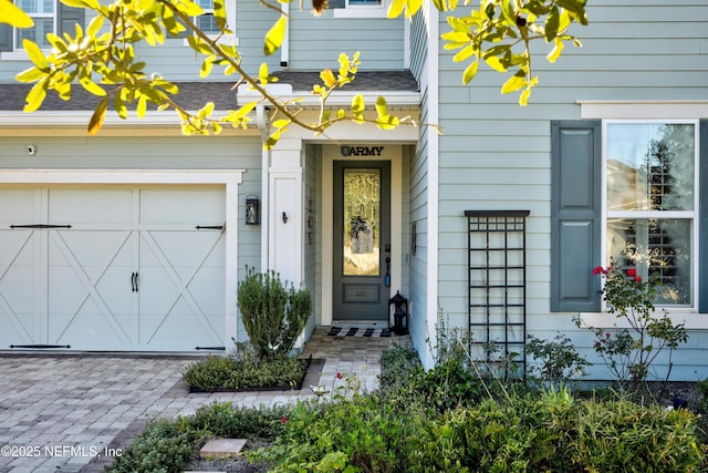 entrance to property featuring a garage