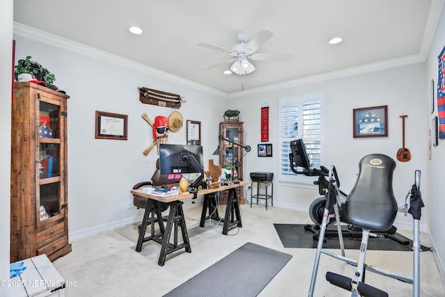 exercise room featuring light colored carpet, ceiling fan, and crown molding