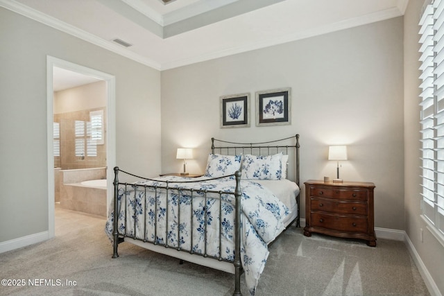 bedroom with crown molding, light carpet, and connected bathroom