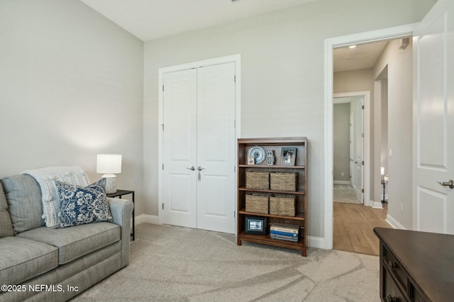 living room featuring light carpet