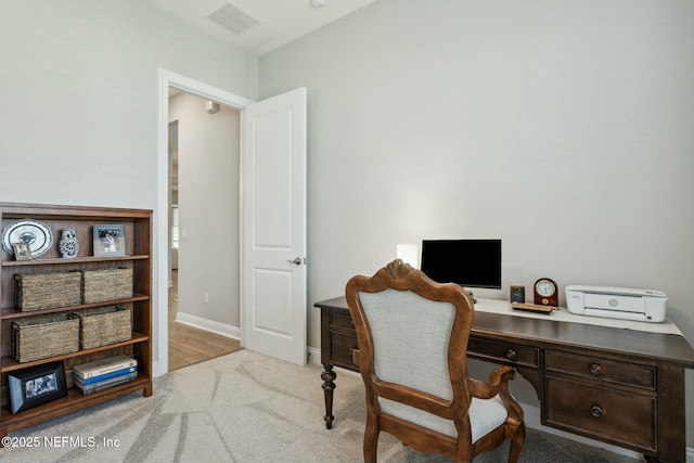 home office with light carpet