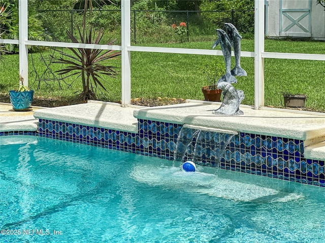 view of pool featuring pool water feature