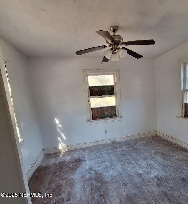 spare room featuring hardwood / wood-style floors