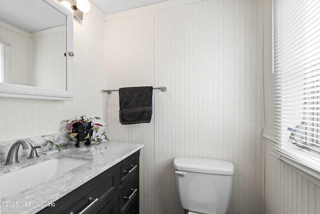 bathroom with vanity and toilet