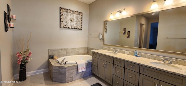 bathroom featuring tile patterned flooring, vanity, and a relaxing tiled tub