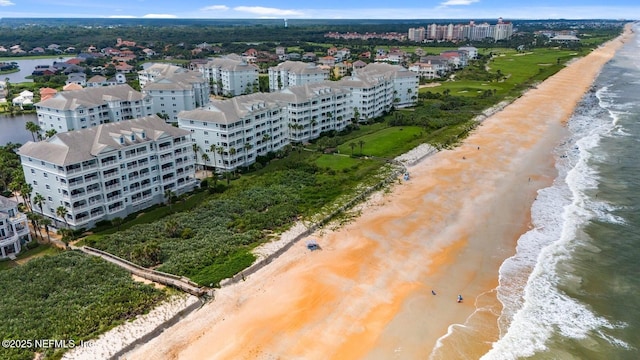 aerial view with a beach view and a water view