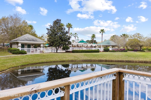 dock area featuring a gazebo and a water view