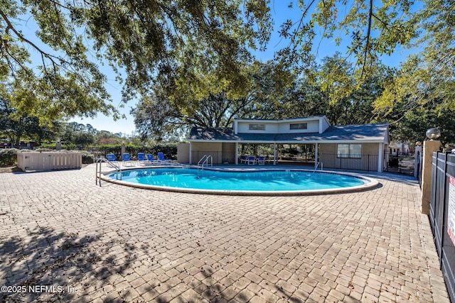 view of pool featuring a patio area